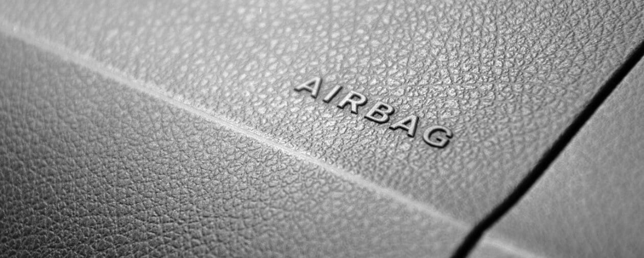 Car dashboard showing words AIRBAG