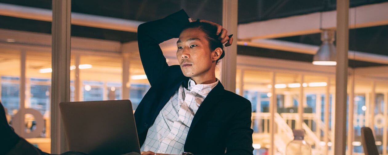 Man alone in office working late