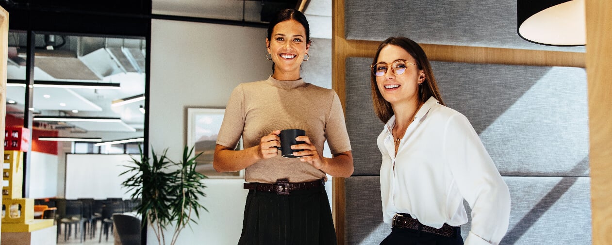 Two colleagues smiling