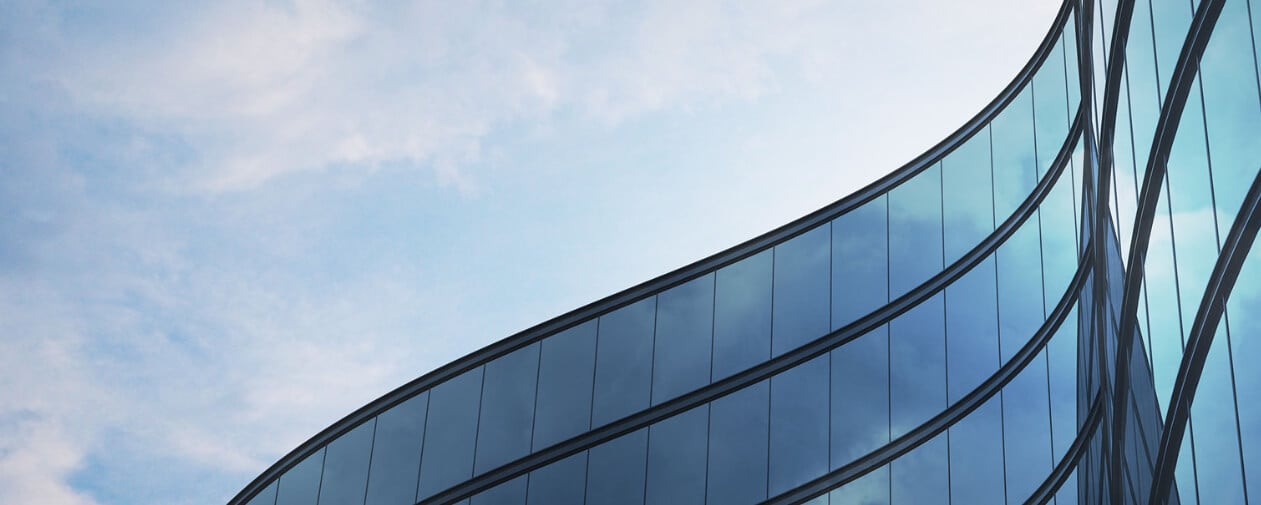 A picture containing cloud, sky, and building