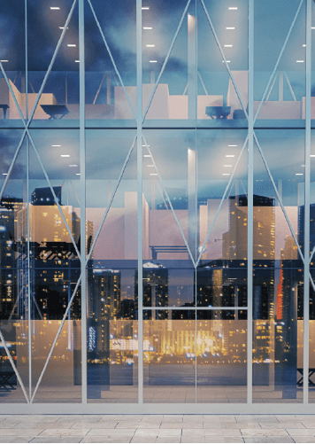 Office building with skyline reflections